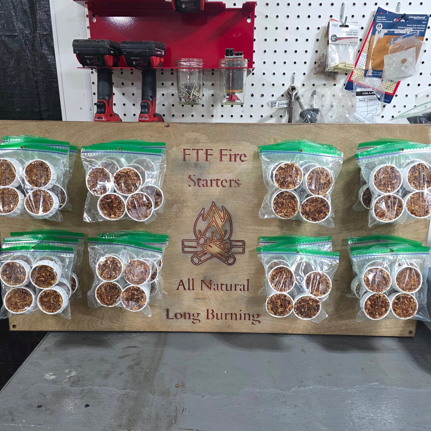 all natural fire starters hung with their packaging. 